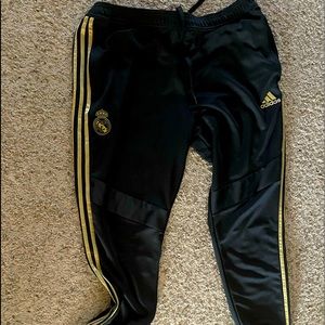 Mens black adidas pants.